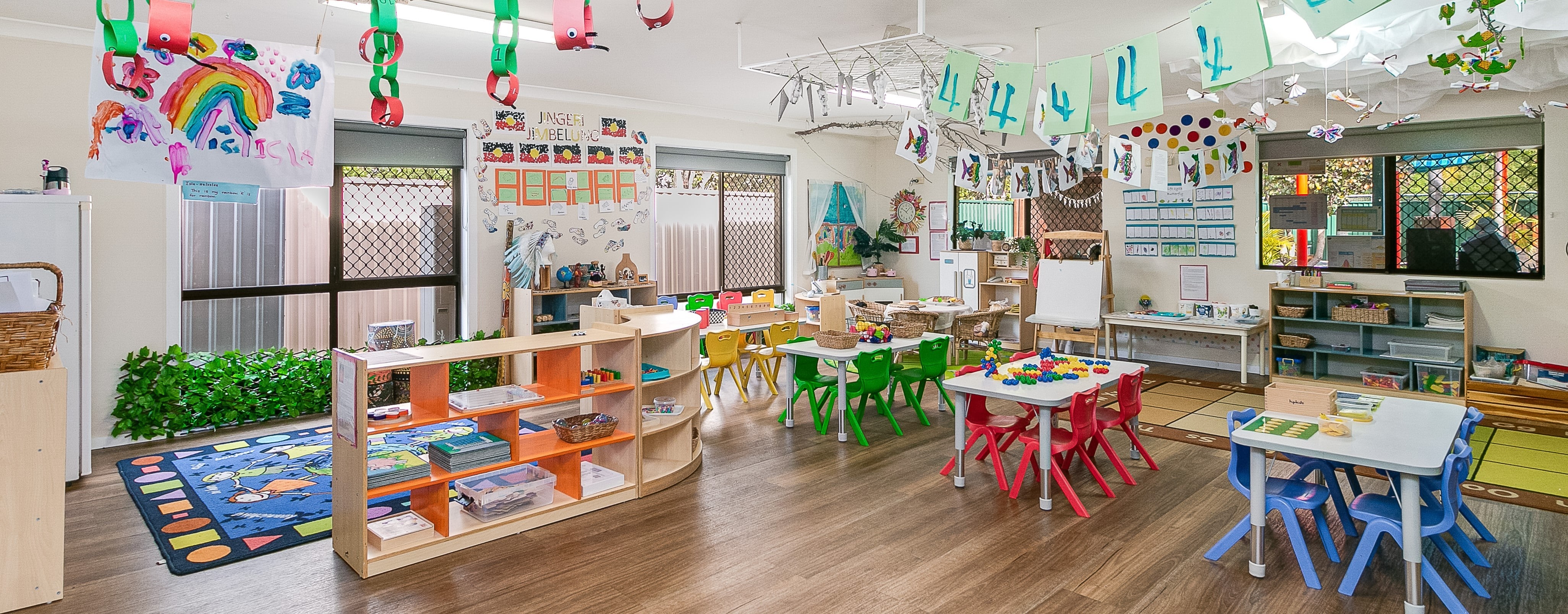 a bright and colorful kindergarten room in Tiny Tots Early Learning Centre