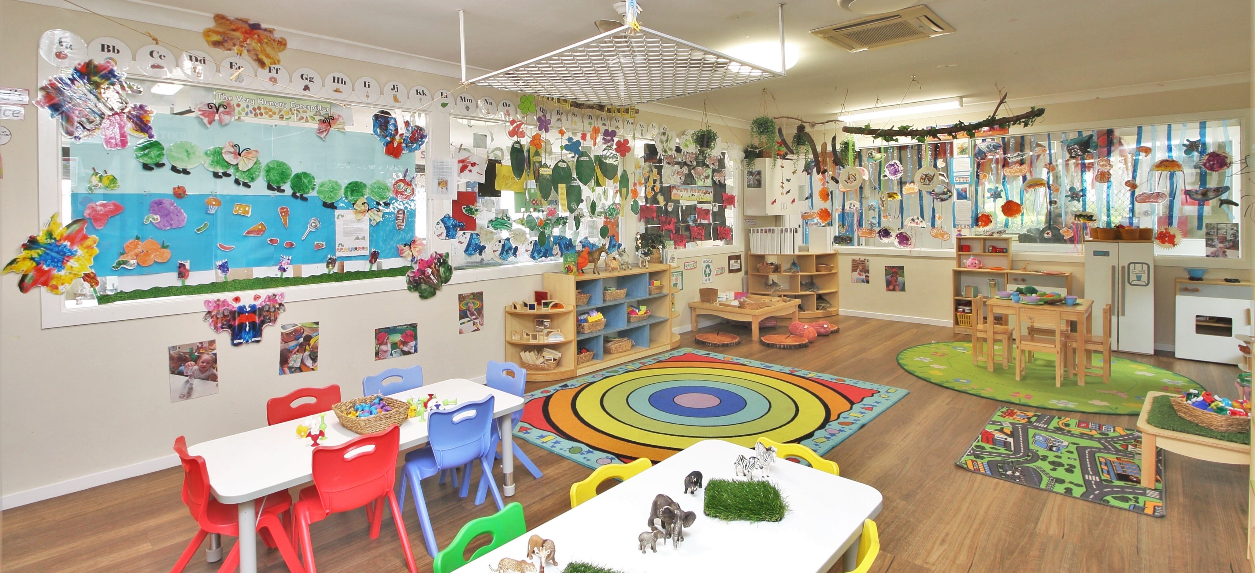 a colorful preschool classroom in Tiny Tots Early Learning